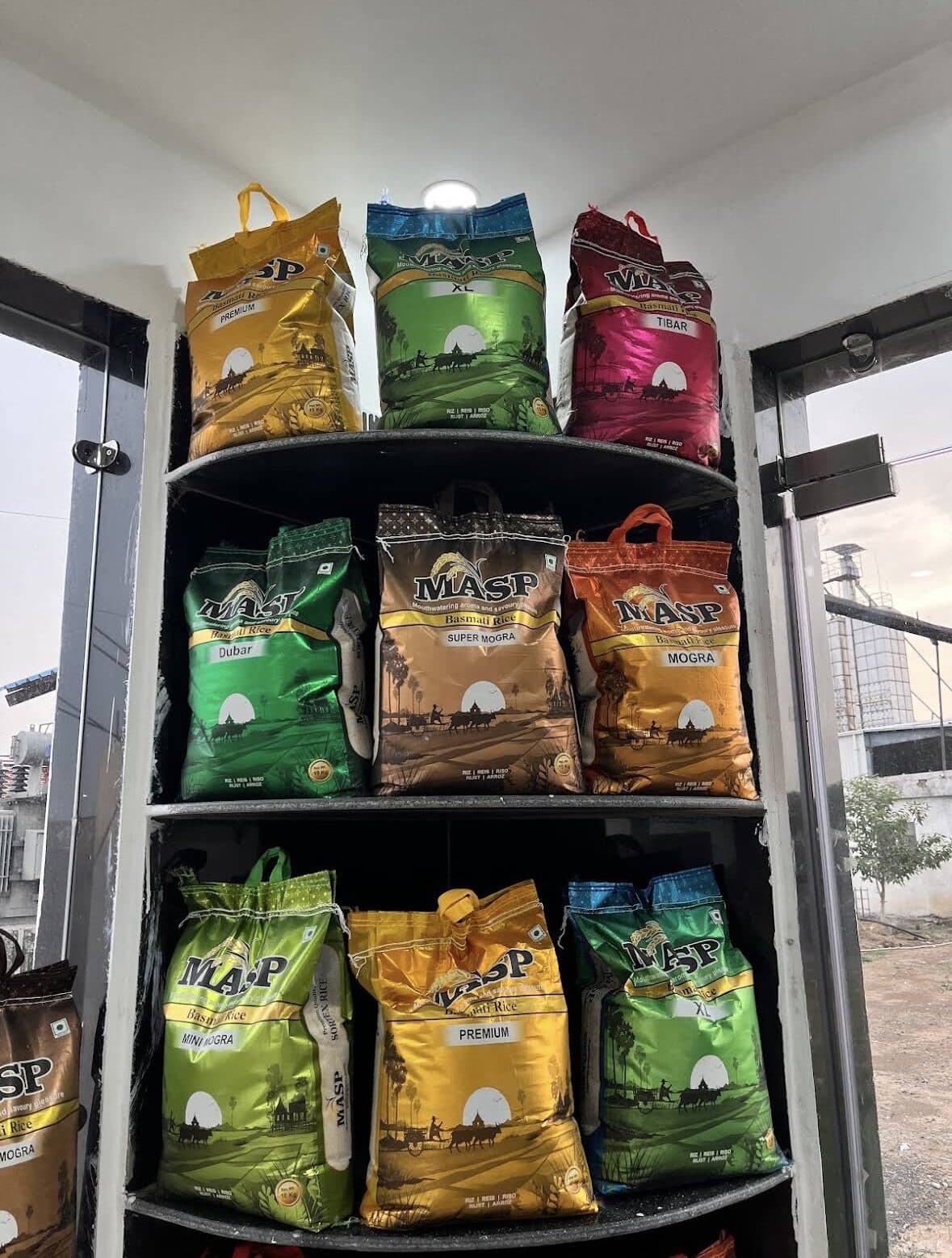 Retail packs of all eight MASP Basmati grades on a display shelf